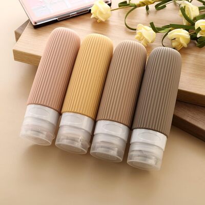 Set x 4 Botellas Siliconadas de Viaje Liso Marron