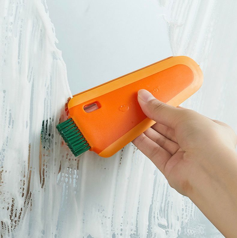 Cepillo Limpiador con Raspador de Silicona Naranja