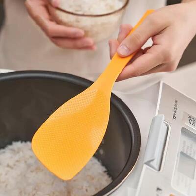 Cuchara/Pala Arrocera Con Apoyo Naranja