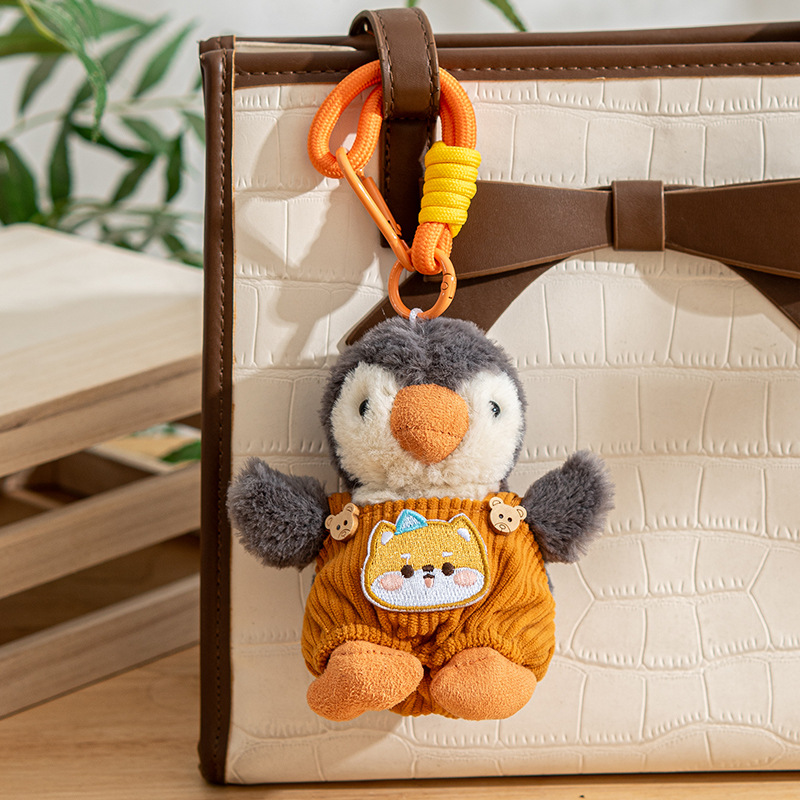 Colgante de Peluche Pingüino Jardinero Naranja