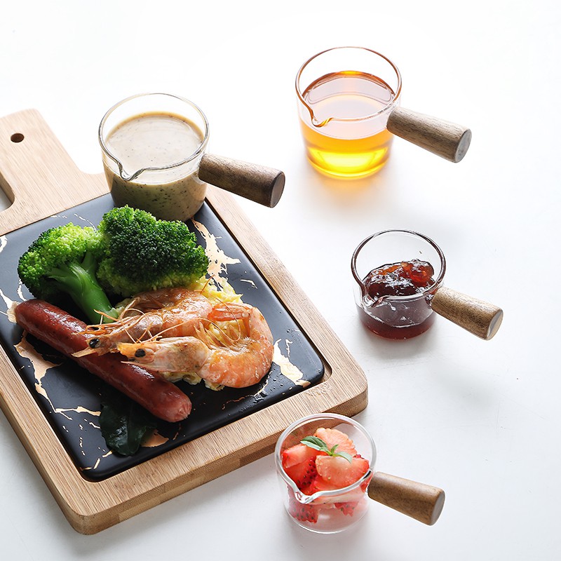 Salsera de Vidrio con Mango de Madera 100ml